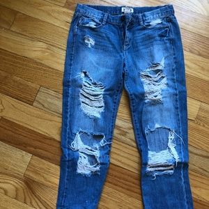 Mid rise distressed jeans